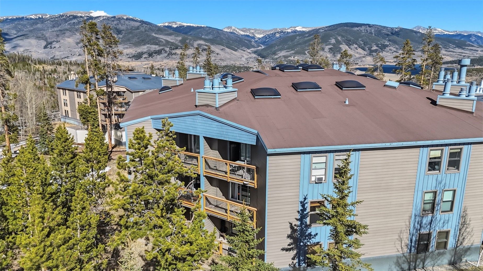 8500 Ryan Gulch Road, Unit 206 Silverthorne, CO 80498 - Photo 26 of 34 an aerial view of a house with a yard