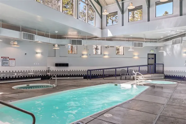 a view of swimming pool with a couch