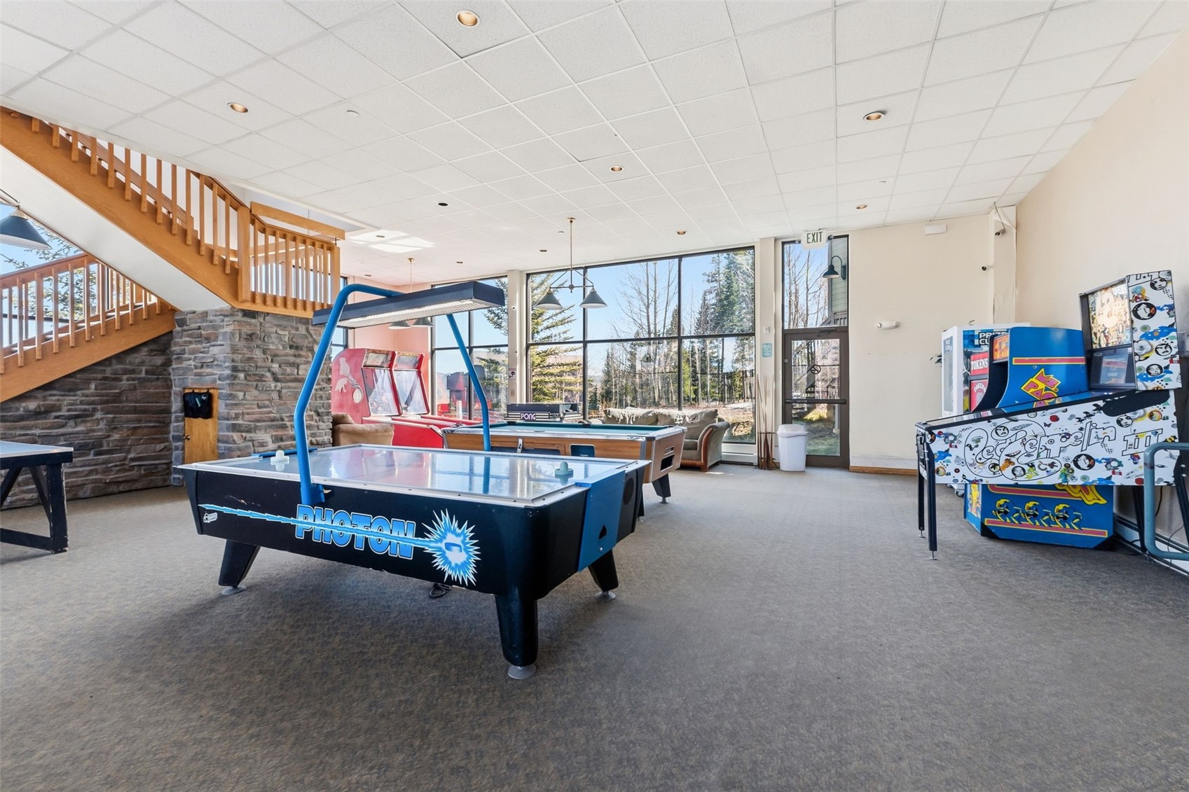 8500 Ryan Gulch Road, Unit 206 Silverthorne, CO 80498 - Photo 33 of 34 a living room with furniture and windows