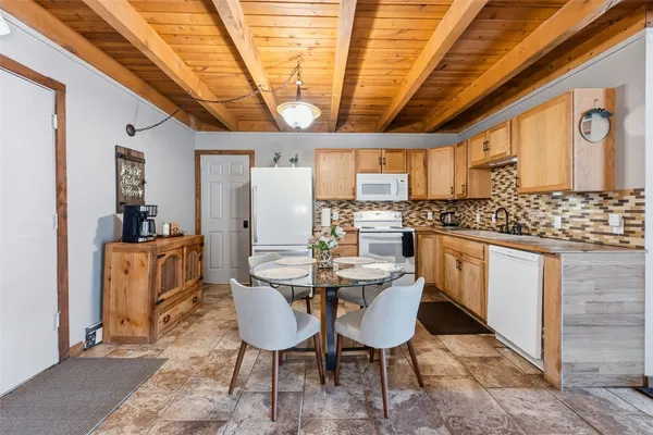 a view of a dining room with furniture