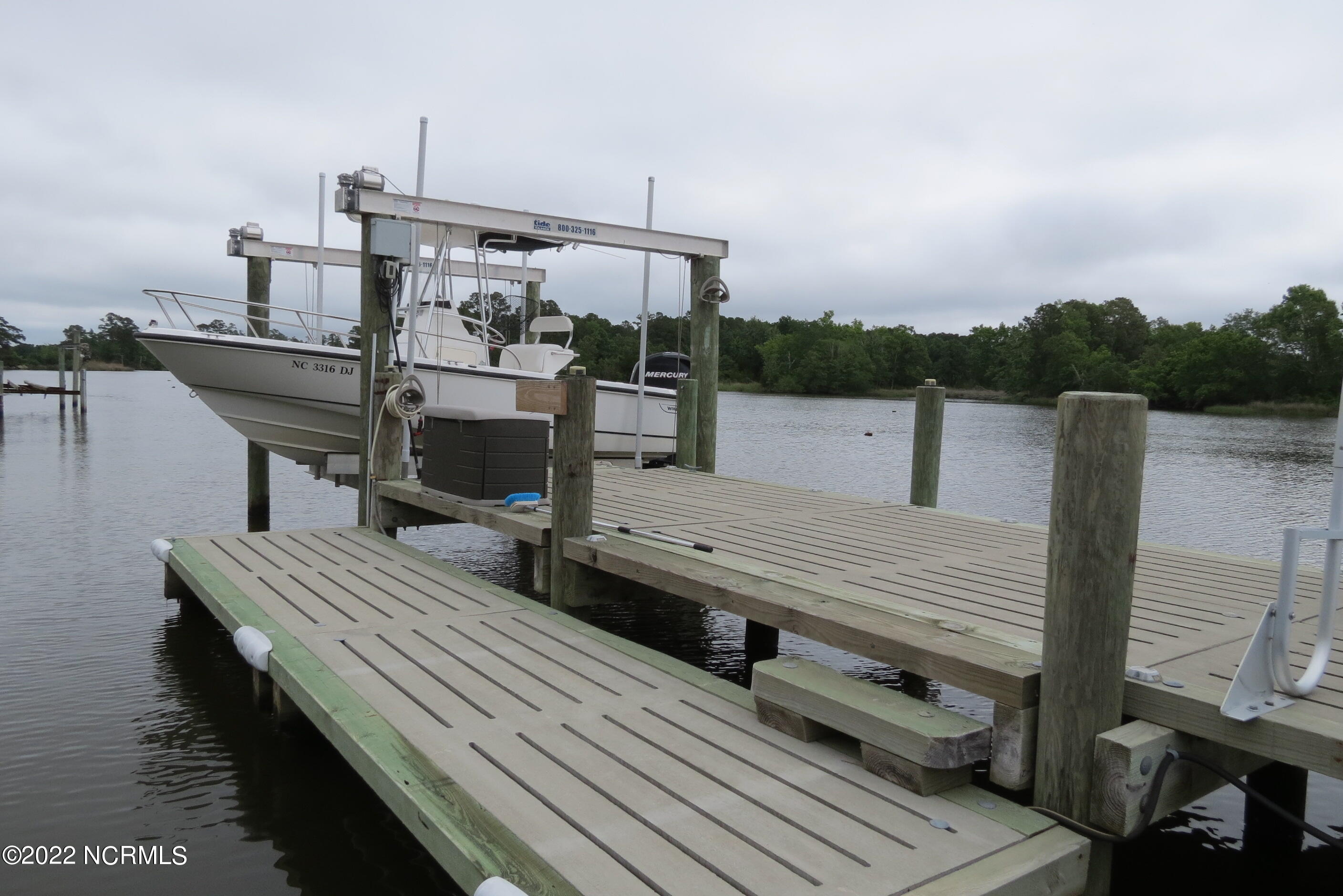 49 Spinnaker Point Road South Oriental, NC 28571 - Photo 23 of 94 Boat lift and kayak/dinghy launch