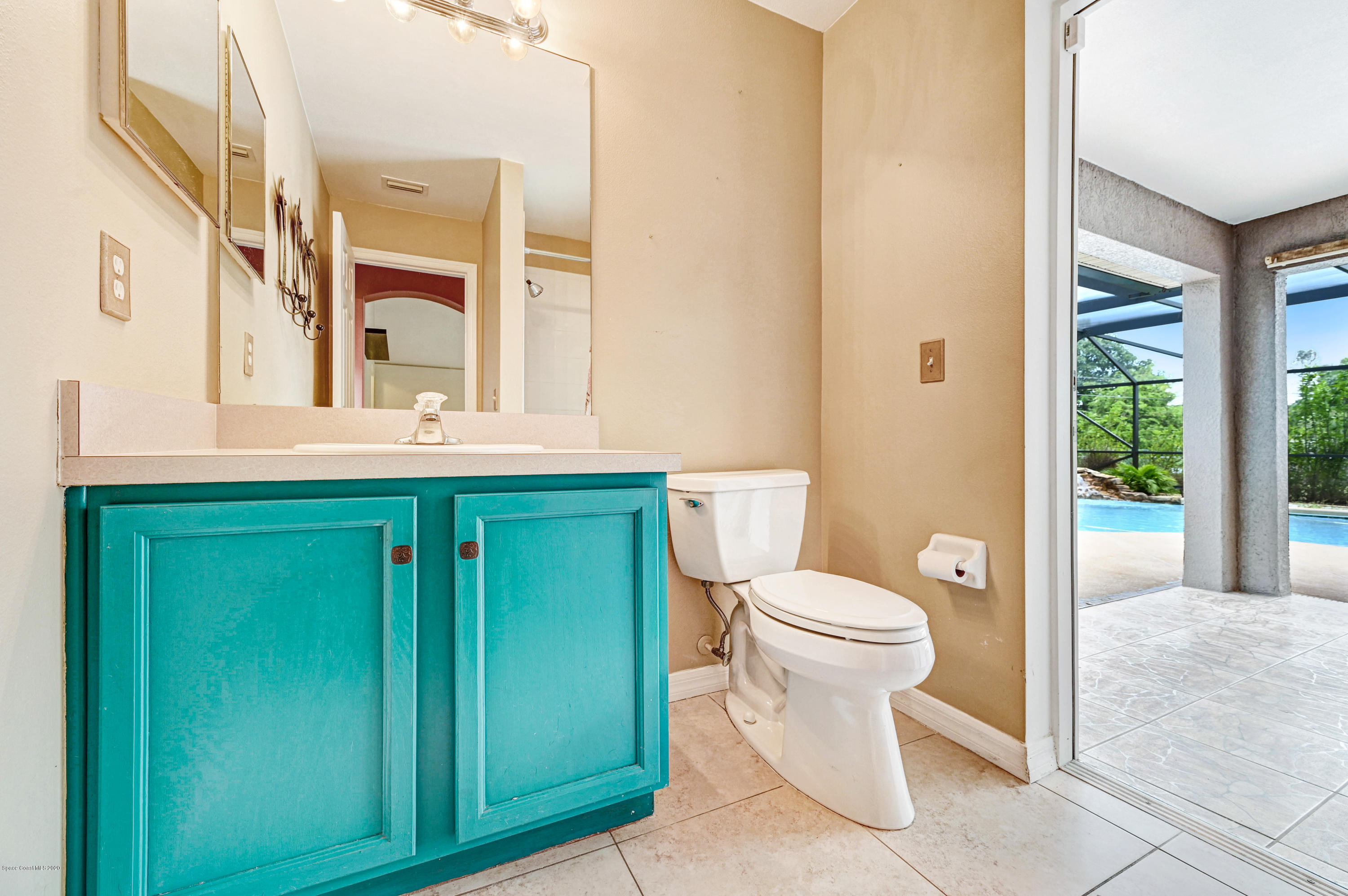 1513 Reed Street Northwest Palm Bay, FL 32907 - Photo 19 of 25 3rd Bath out to Pool