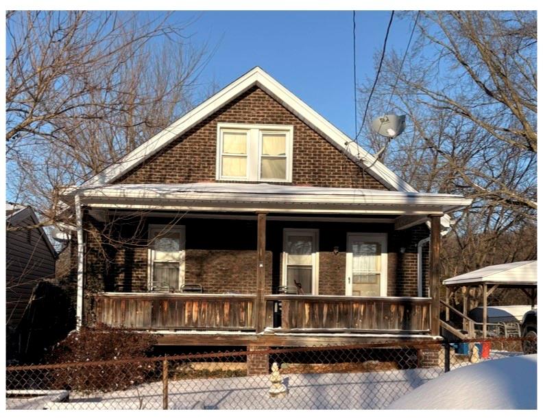 a view of house with balcony
