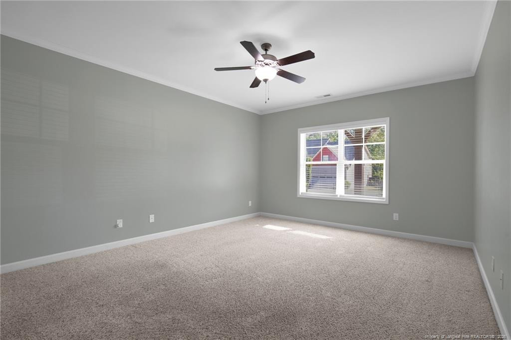 132 Shellbark Drive Spring Lake, NC 28390 - Photo 18 of 44 a view of an empty room with a window