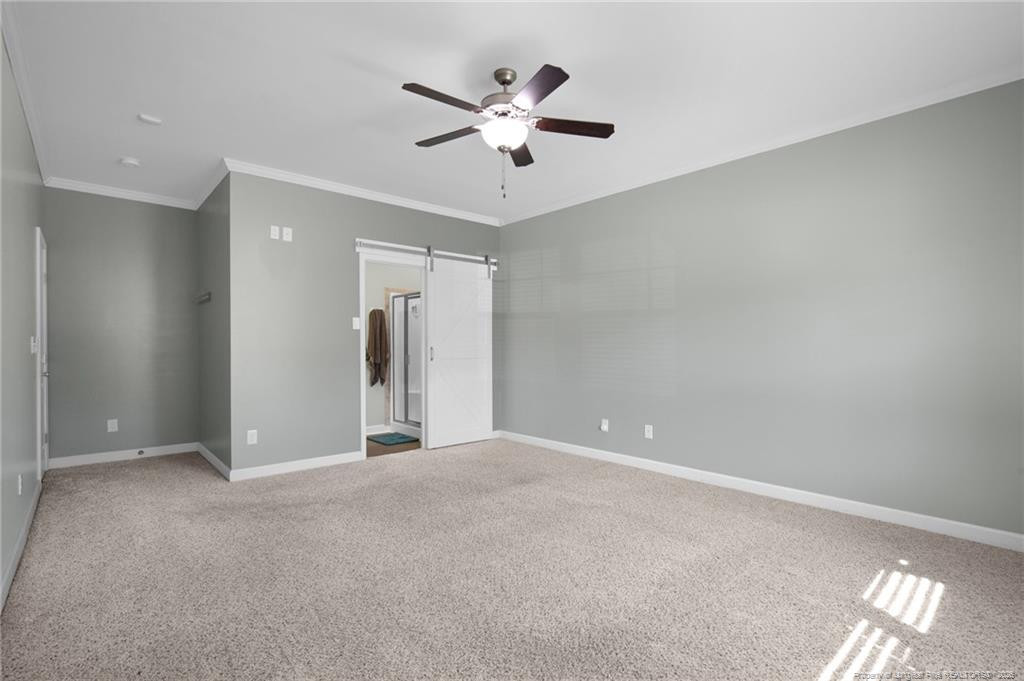 132 Shellbark Drive Spring Lake, NC 28390 - Photo 19 of 44 a view of an empty room with a ceiling fan