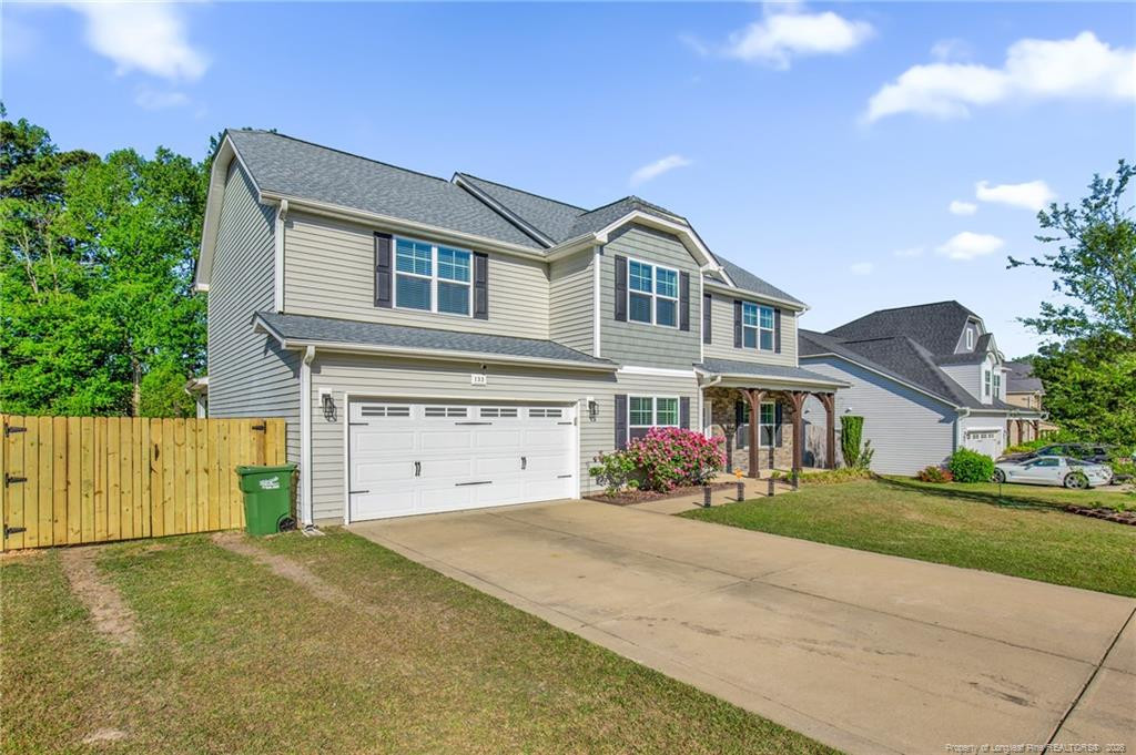 132 Shellbark Drive Spring Lake, NC 28390 - Photo 2 of 44 a front view of a house with a yard