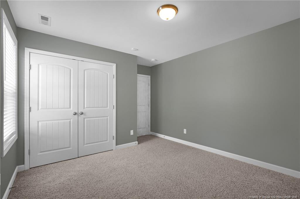132 Shellbark Drive Spring Lake, NC 28390 - Photo 28 of 44 an empty room with closet area