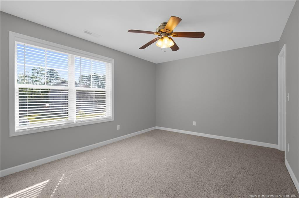 132 Shellbark Drive Spring Lake, NC 28390 - Photo 30 of 44 a view of an empty room with a window