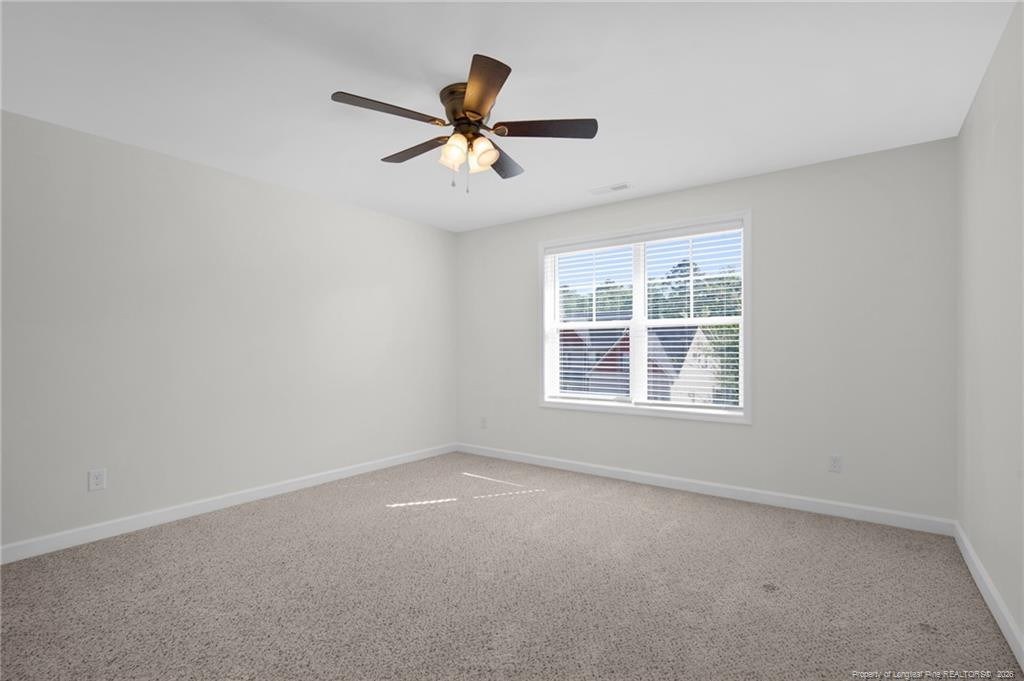 132 Shellbark Drive Spring Lake, NC 28390 - Photo 34 of 44 a view of an empty room with a window