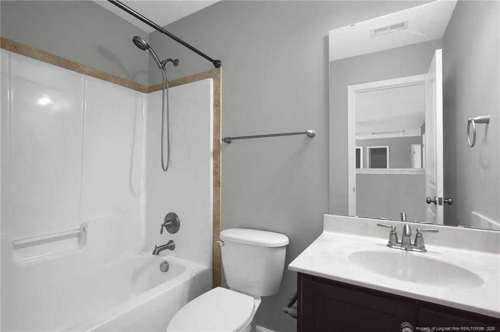 132 Shellbark Drive Spring Lake, NC 28390 - Photo 36 of 44 a bathroom with a sink toilet and shower