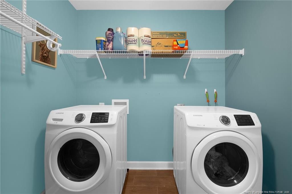 132 Shellbark Drive Spring Lake, NC 28390 - Photo 37 of 44 a utility room with dryer and washer