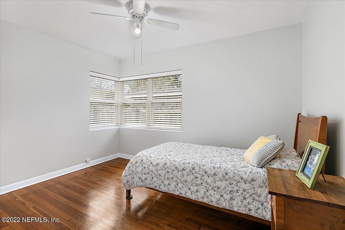 6136 Duke Road Jacksonville, FL 32217 - Photo 16 of 23 a bedroom with bed and window