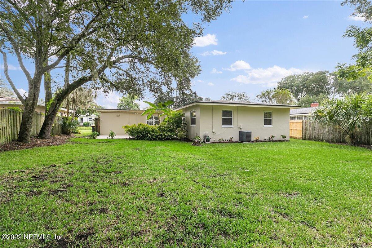 6136 Duke Road Jacksonville, FL 32217 - Photo 20 of 23 a view of a house with backyard and garden