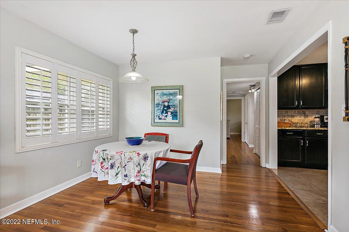 6136 Duke Road Jacksonville, FL 32217 - Photo 9 of 23 a dining room with furniture and window
