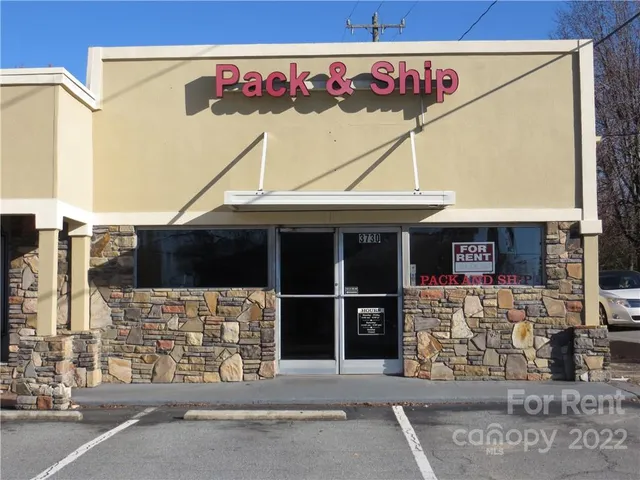 a view of a street sign on a road