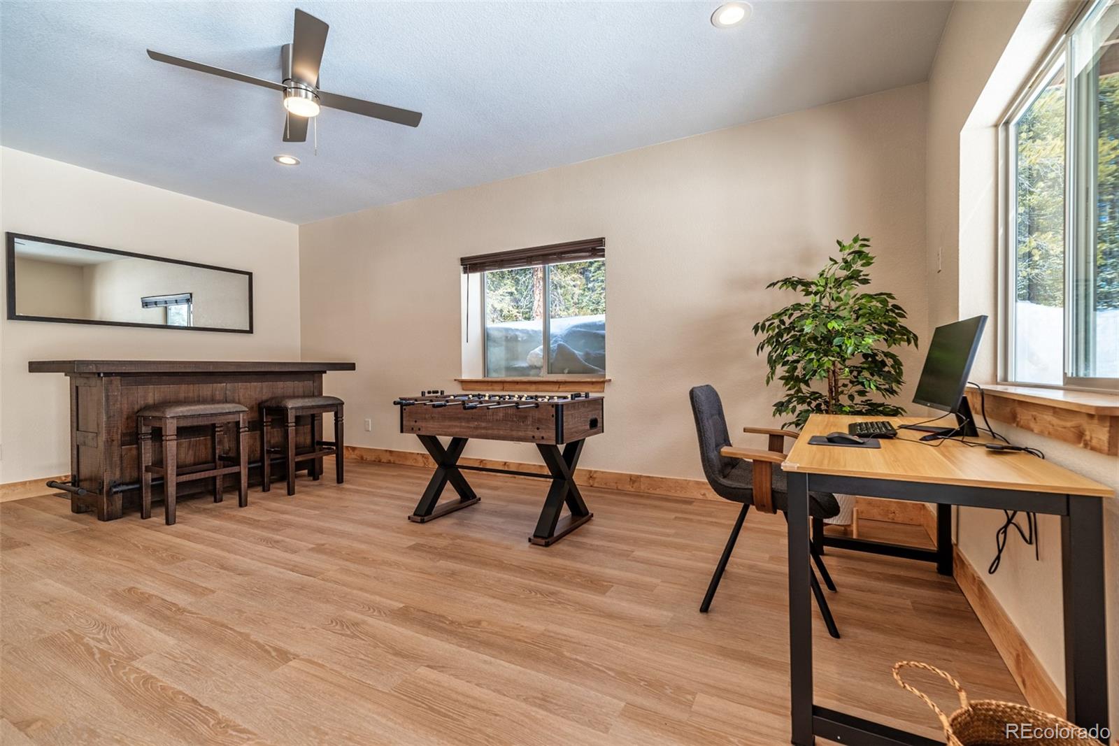 526 Porcupine Road Fairplay, CO 80440 - Photo 30 of 46 a workspace with furniture window and wooden floor