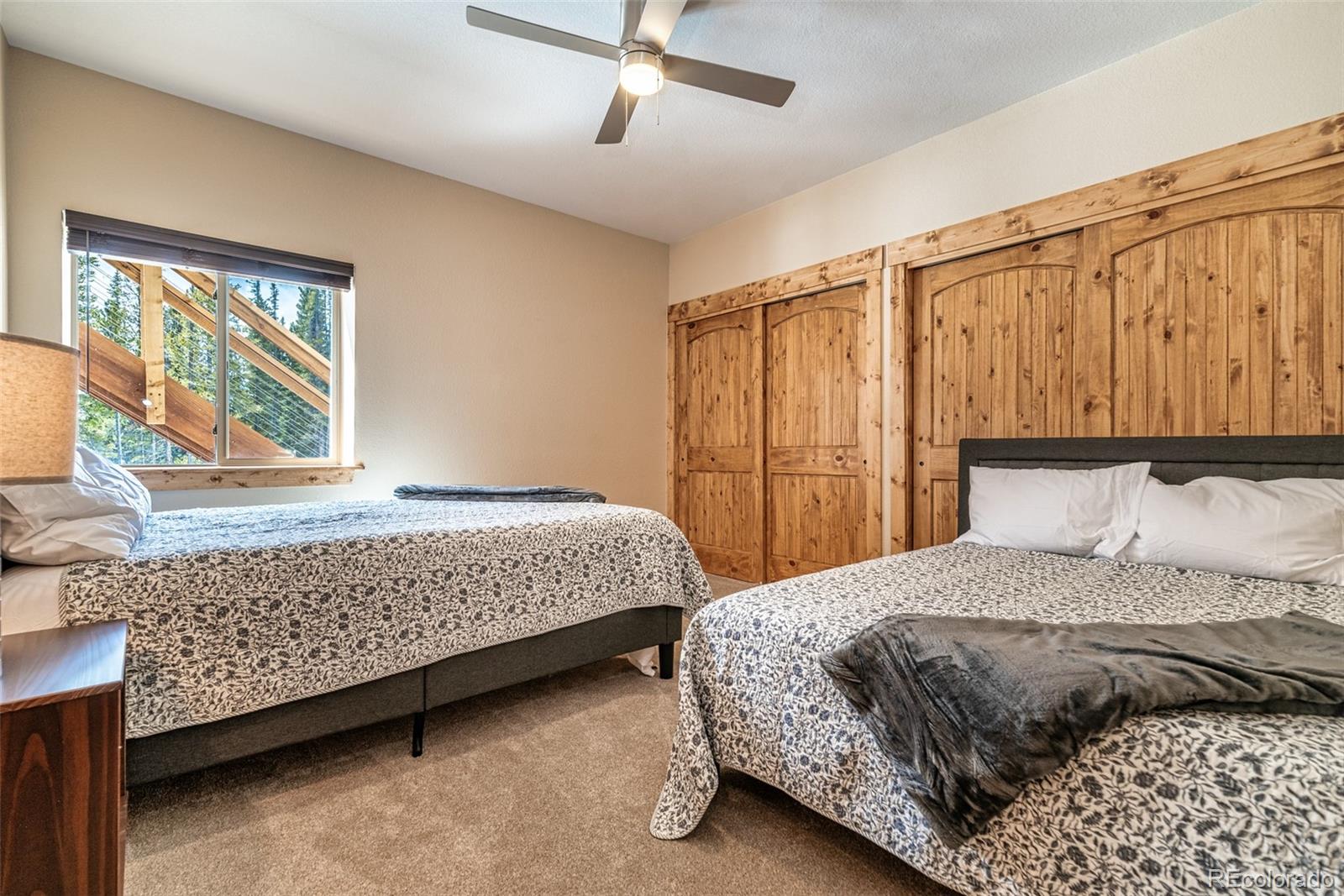 526 Porcupine Road Fairplay, CO 80440 - Photo 31 of 46 a bedroom with a bed and window