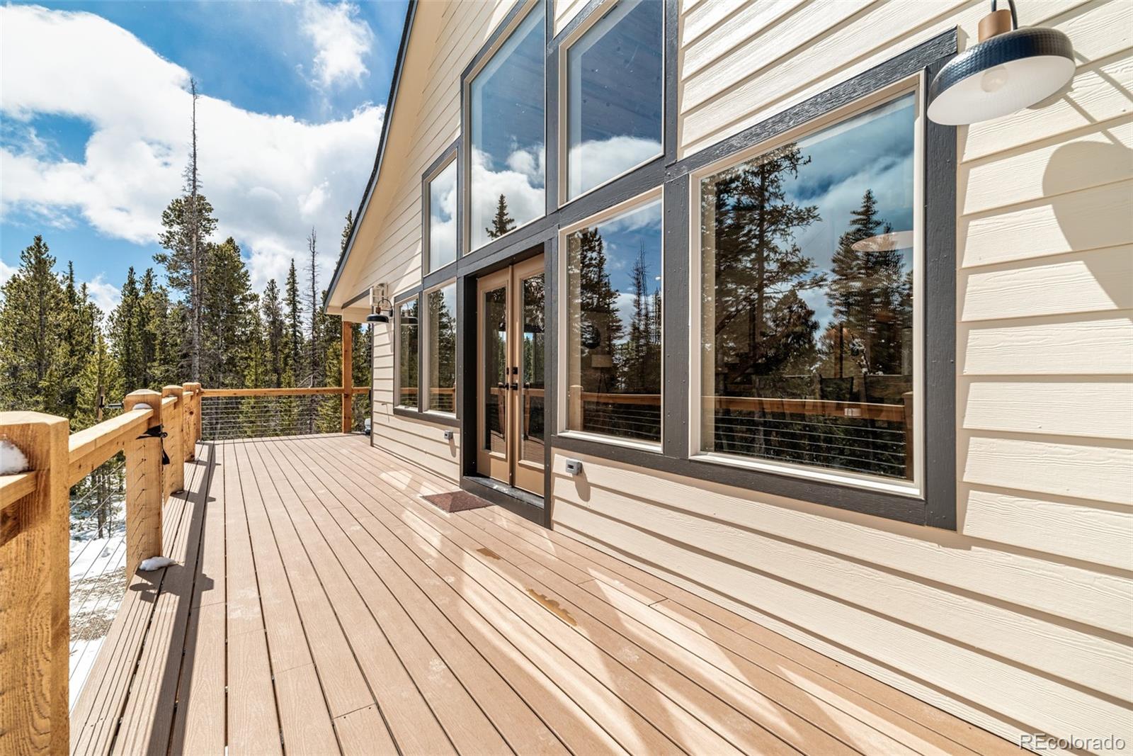 526 Porcupine Road Fairplay, CO 80440 - Photo 37 of 46 a view of a house with a large window and wooden floor