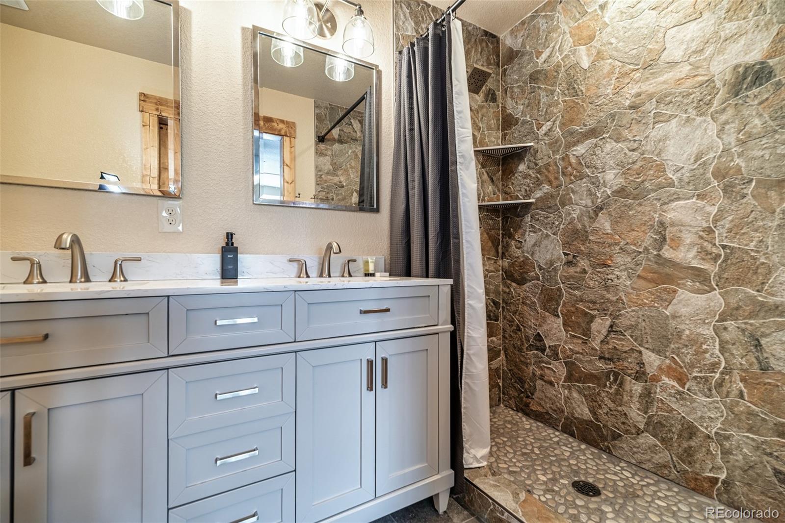 526 Porcupine Road Fairplay, CO 80440 - Photo 4 of 46 a bathroom with a sink and a mirror