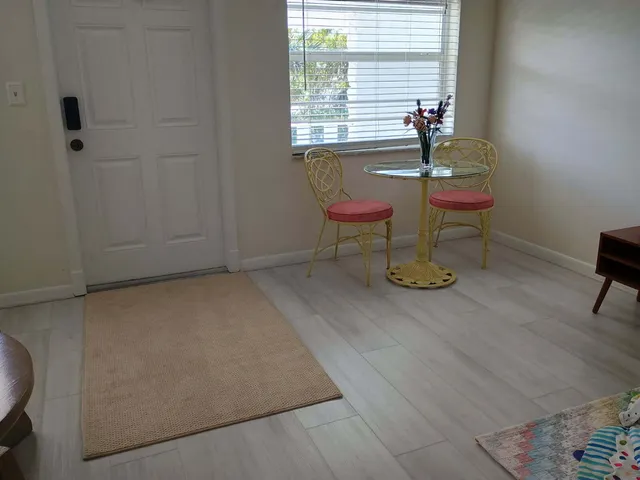 a workspace with furniture and a window