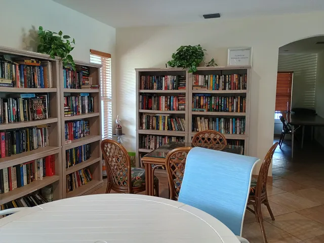a view of a livingroom with a bookshelf