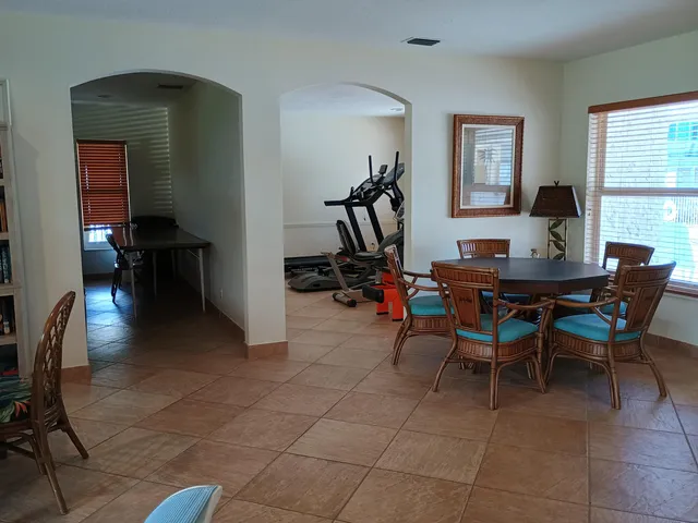 a view of a dining room with furniture