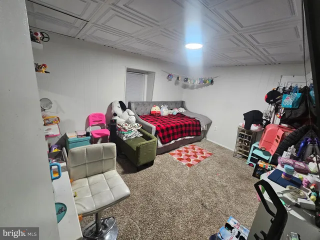 a view of gym equipment and children play room