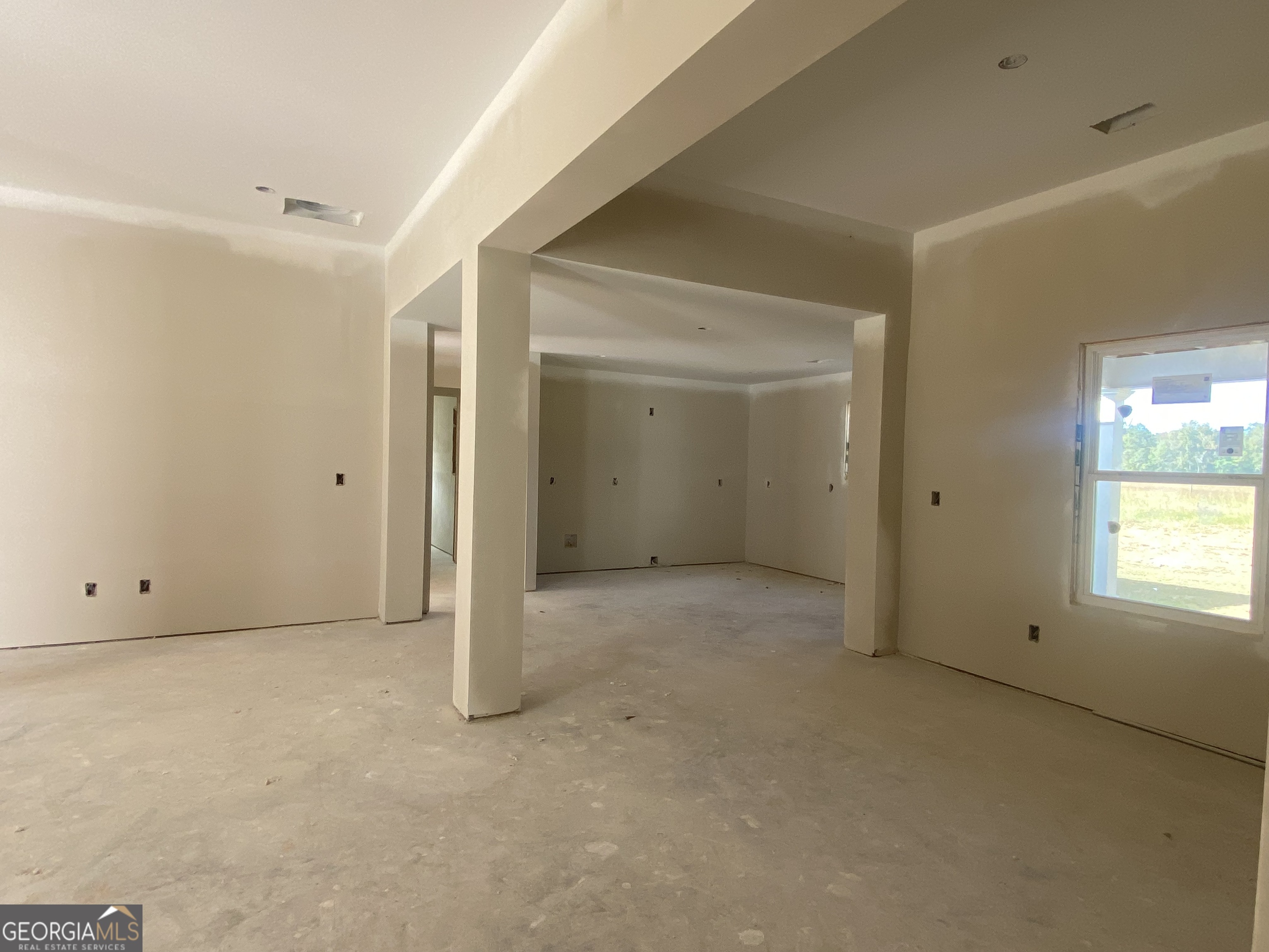 168 Mathews Road Milner, GA 30257 - Photo 14 of 14 a view of an empty room with a window
