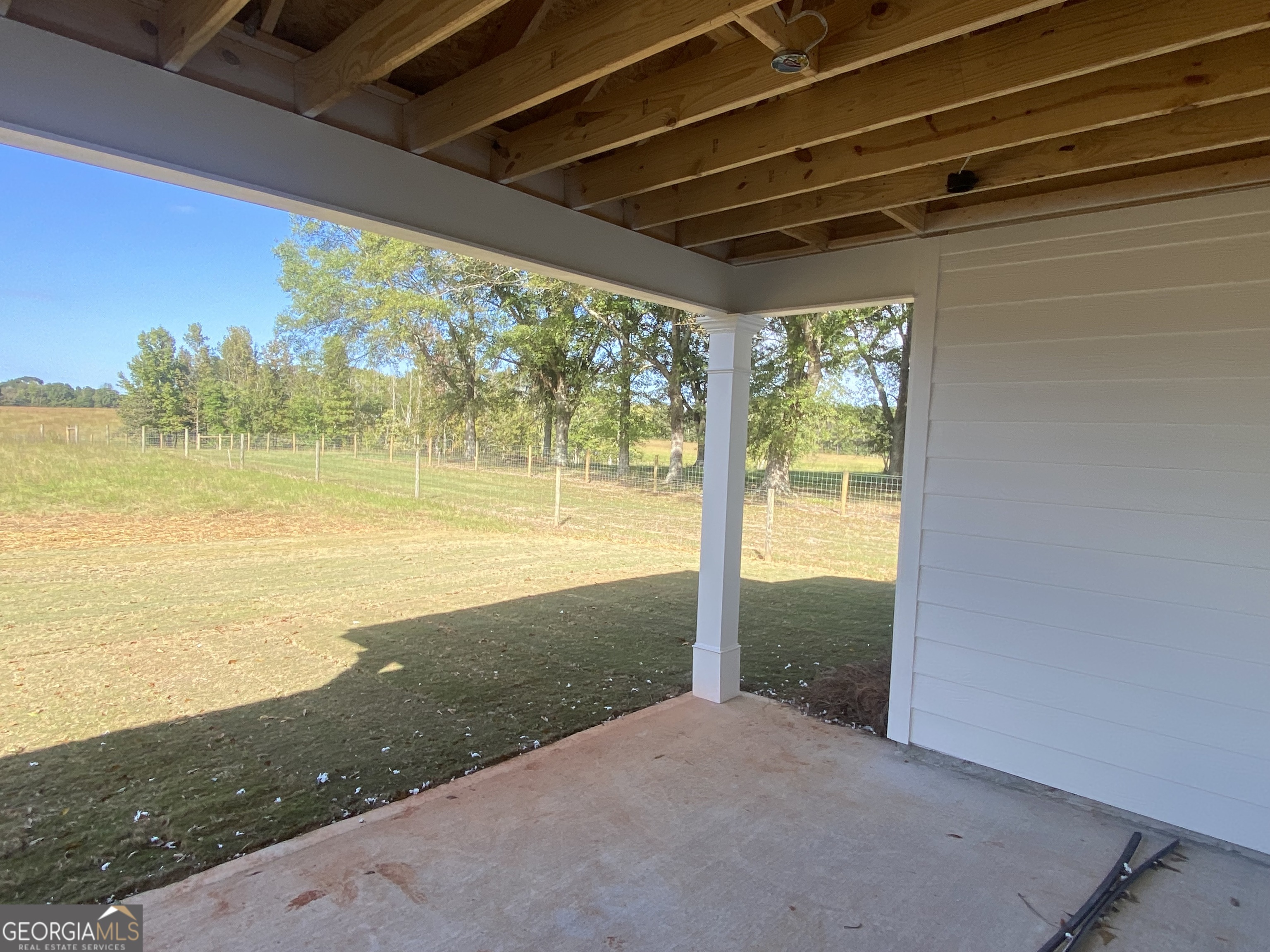 168 Mathews Road Milner, GA 30257 - Photo 4 of 14 a view of a floor to ceiling window and an ocean view