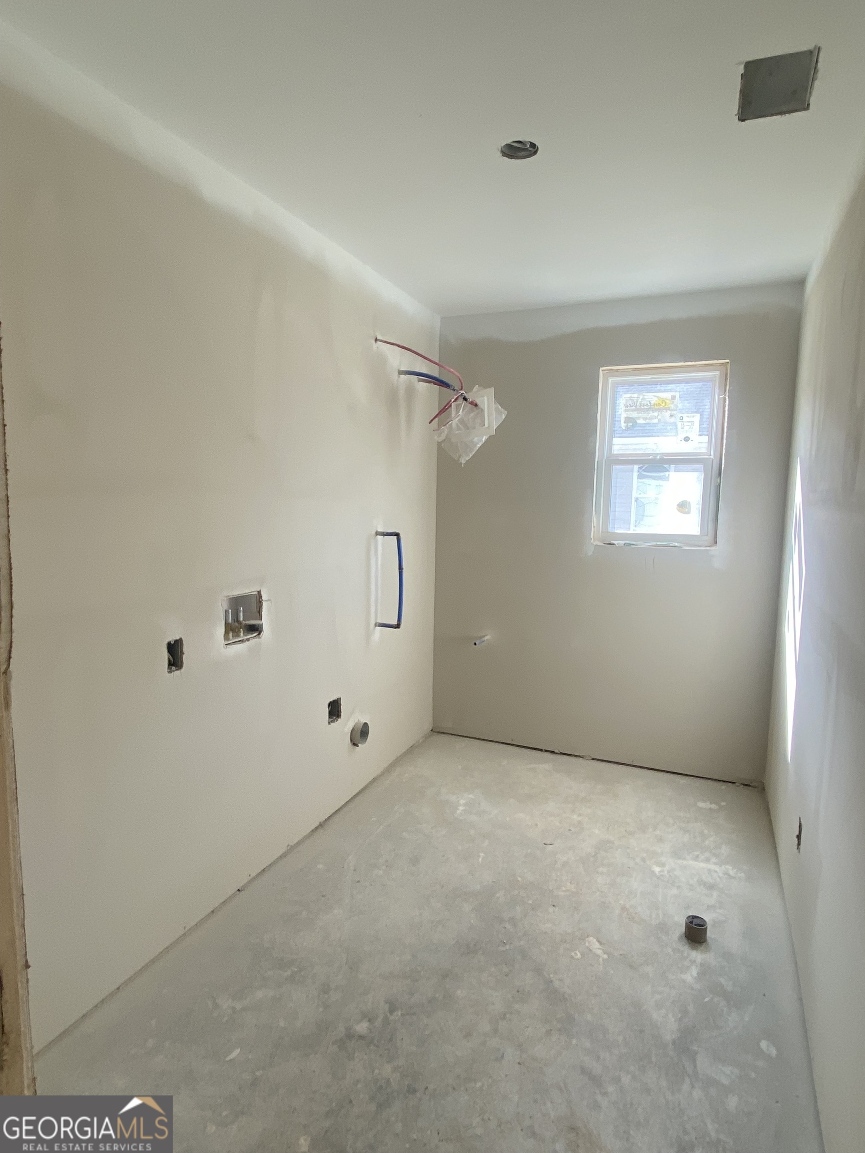 168 Mathews Road Milner, GA 30257 - Photo 7 of 14 a view of an empty room