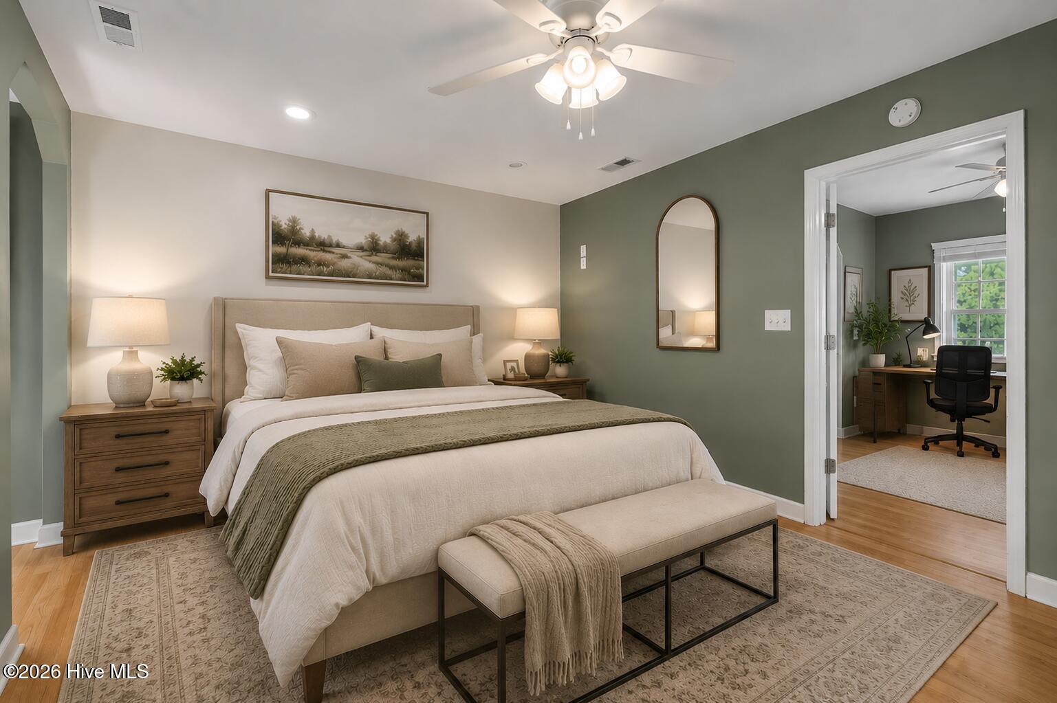 477 Harkers Island Road Beaufort, NC 28516 - Photo 18 of 38 Spacious primary suite virtually staged to highlight the adjoining office/flex room and spa-like en suite bath.