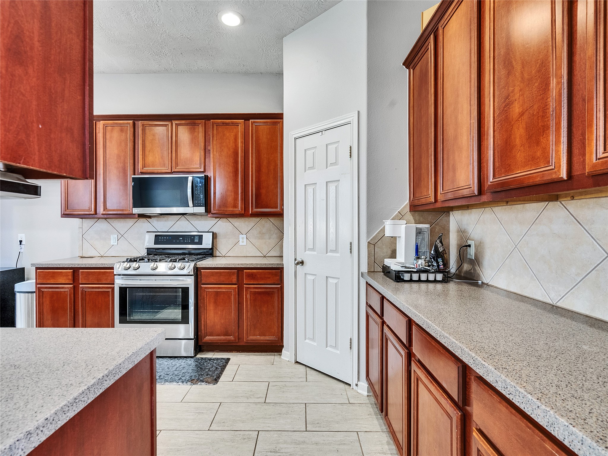 2615 Fern Lacy Drive Spring, TX 77388 - Photo 11 of 32 The kitchen has plenty of storage space