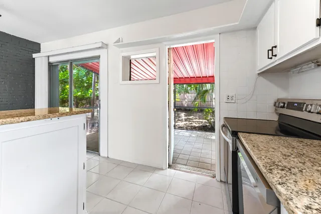 a kitchen with a stove and a kitchen