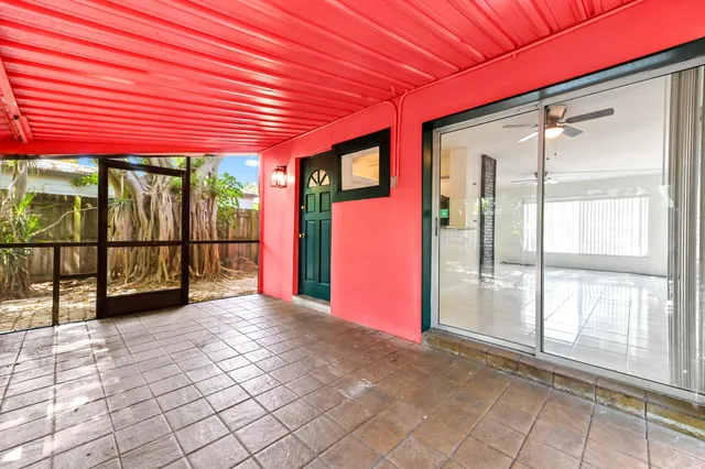 a view of a porch with furniture