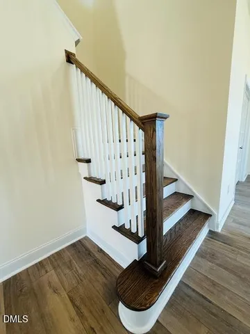 a view of entryway with wooden floor