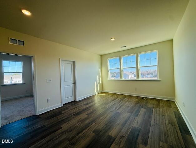 76 Alden Way Angier, NC 27501 - Photo 18 of 25 wooden floor in an empty room with a window
