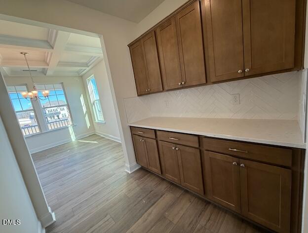 76 Alden Way Angier, NC 27501 - Photo 6 of 25 a kitchen with wooden cabinets