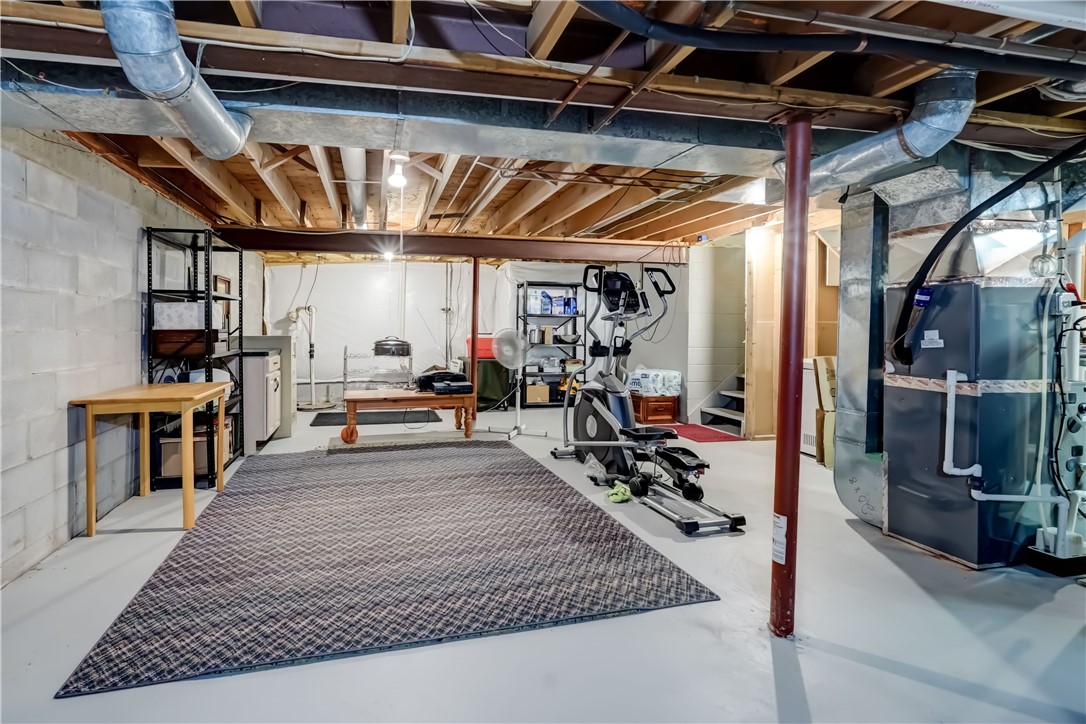 6 Daisy Lane Chili, NY 14514 - Photo 29 of 34 LOADS of storage space in the full basement!