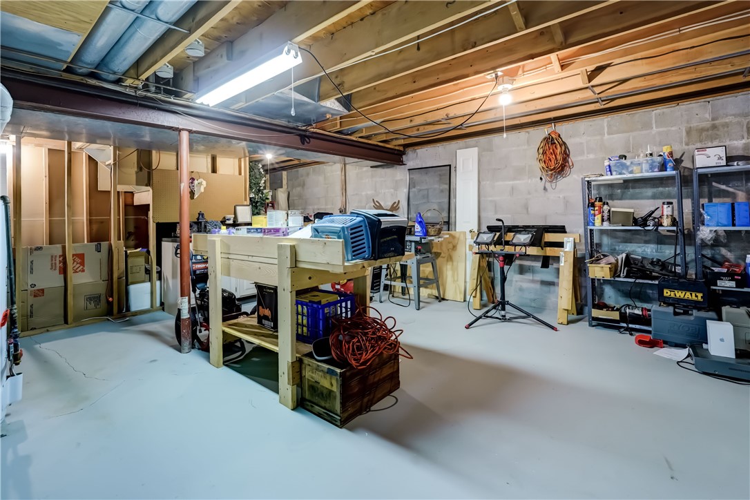 6 Daisy Lane Chili, NY 14514 - Photo 30 of 34 Shelves, cabinets & work bench stay!