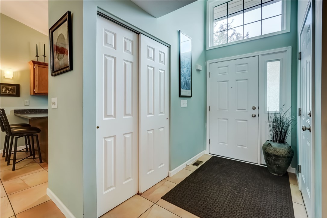 6 Daisy Lane Chili, NY 14514 - Photo 3 of 34 Enter the front door to convenient coat closet.