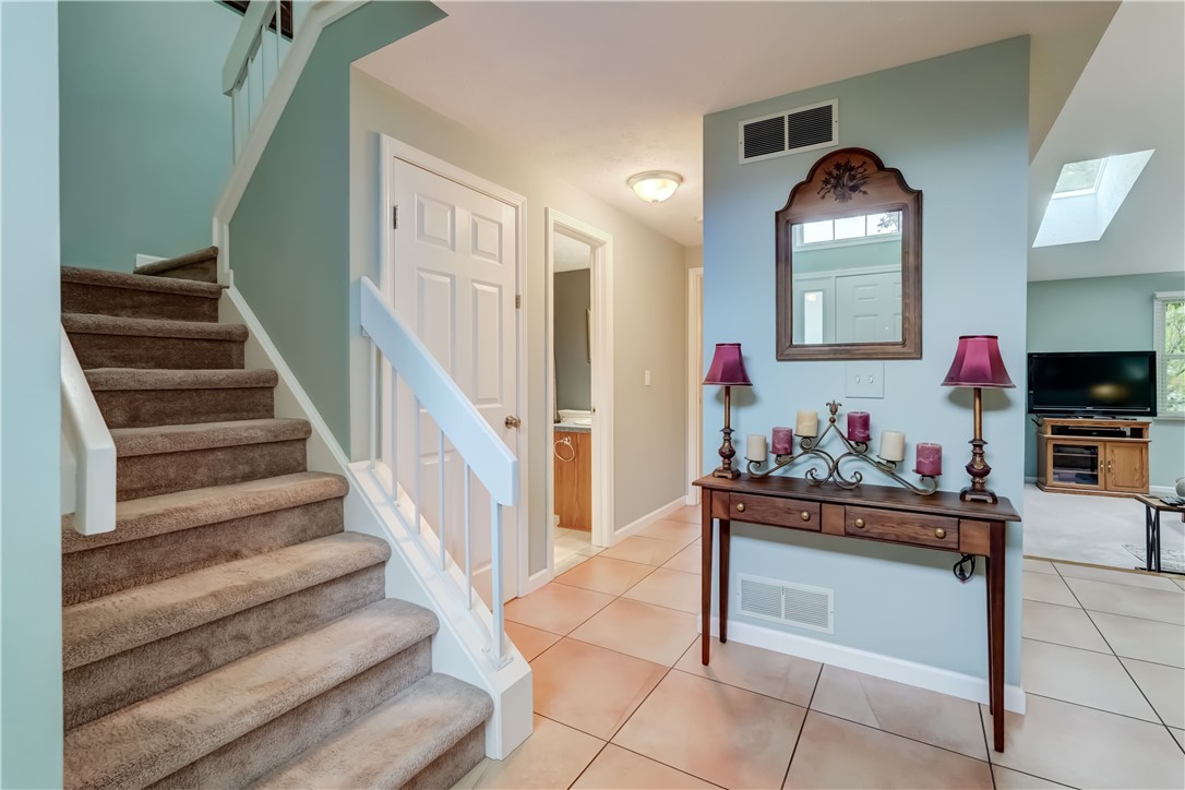 6 Daisy Lane Chili, NY 14514 - Photo 5 of 34 Stairs lead to 2nd floor bedroom w/en suite bath &