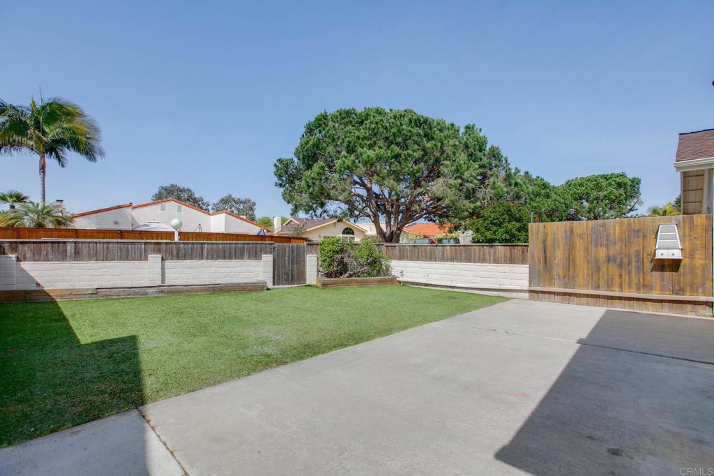 810 Caminito Del Mar Carlsbad, CA 92011 - Photo 24 of 30 a front view of a house with a yard and garage