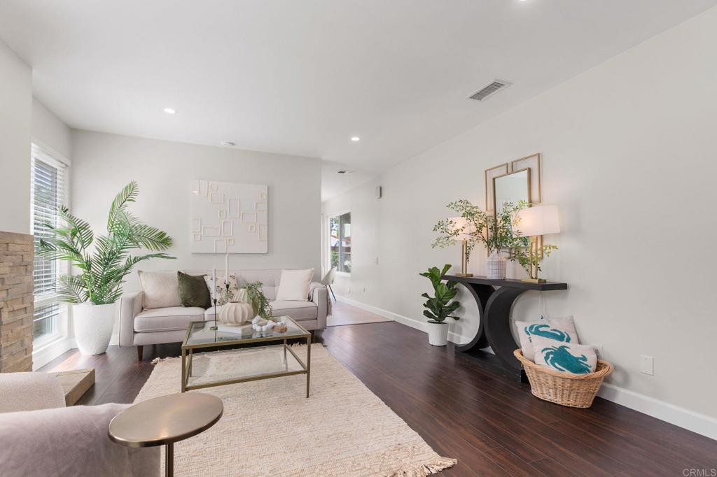 810 Caminito Del Mar Carlsbad, CA 92011 - Photo 6 of 30 a living room with furniture and a potted plant