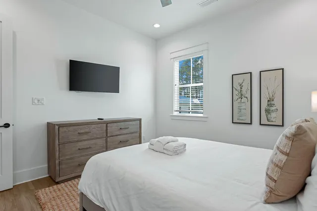 a view of a swimming pool with sitting area