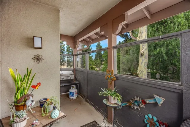 a view of a patio filled with furniture