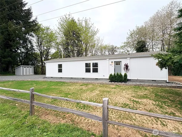 a view of a house with a swimming pool