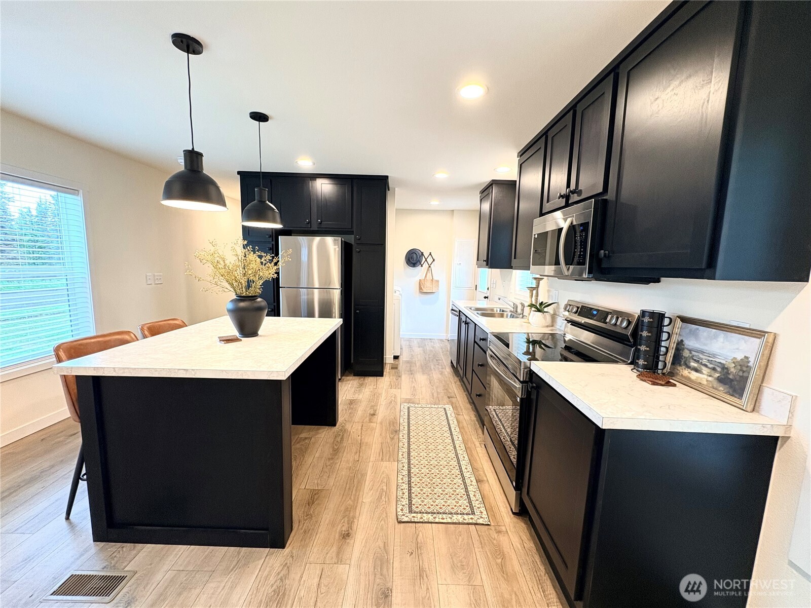 763 Eadon Road Toledo, WA 98591 - Photo 6 of 28 a kitchen with a sink and stove
