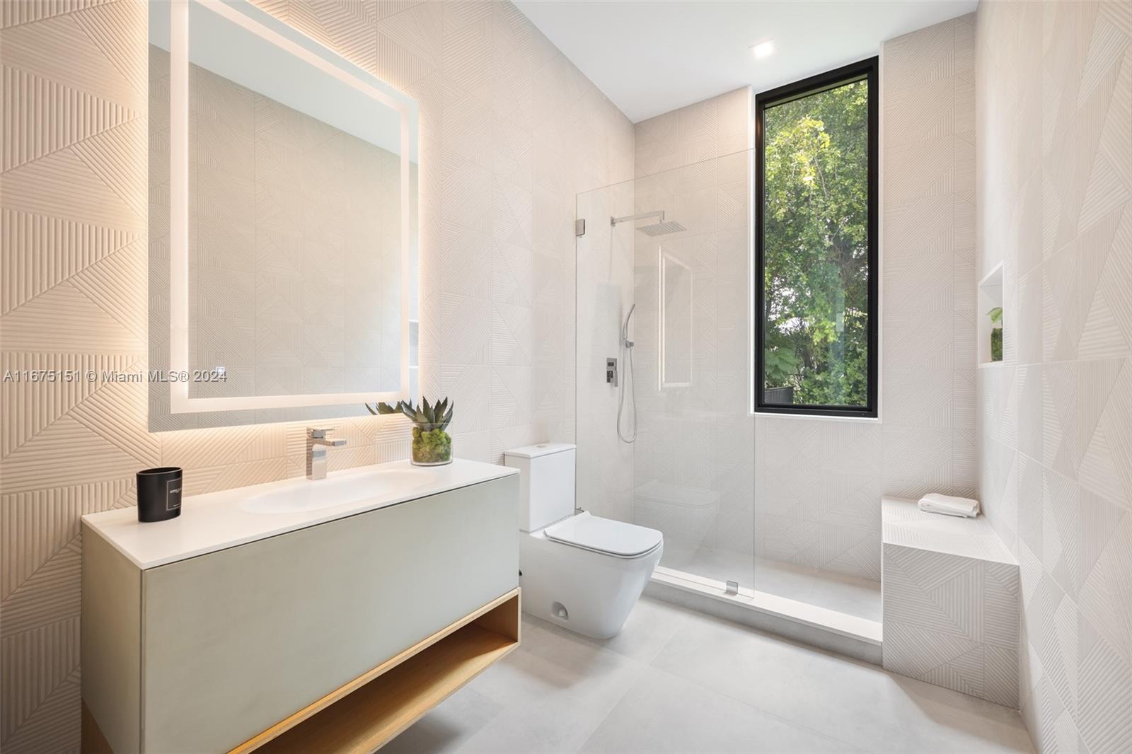7425 Southwest 136th Street Pinecrest, FL 33156 - Photo 46 of 60 a bathroom with a sink toilet and shower