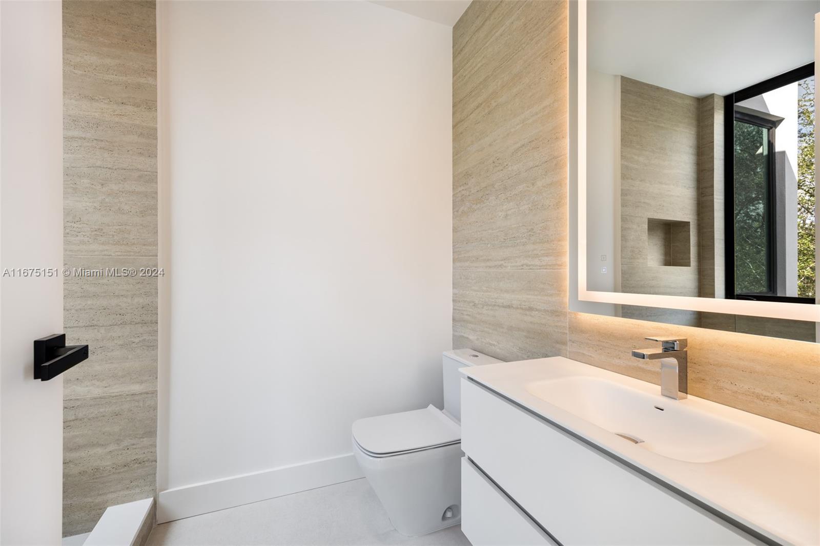 7425 Southwest 136th Street Pinecrest, FL 33156 - Photo 47 of 60 a bathroom with a sink a toilet and shower