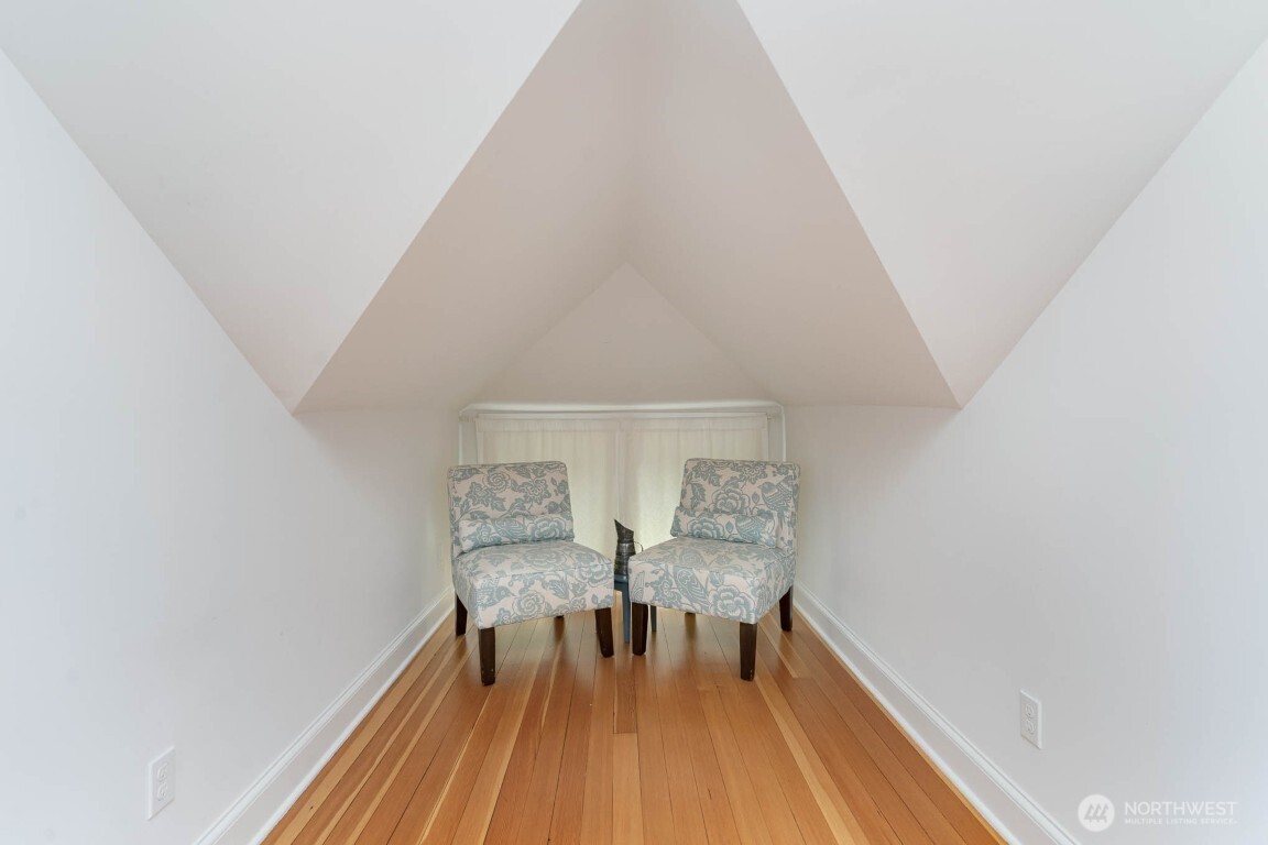 1607 6th Avenue West Seattle, WA 98119 - Photo 17 of 27 a view of livingroom with furniture and wooden floor